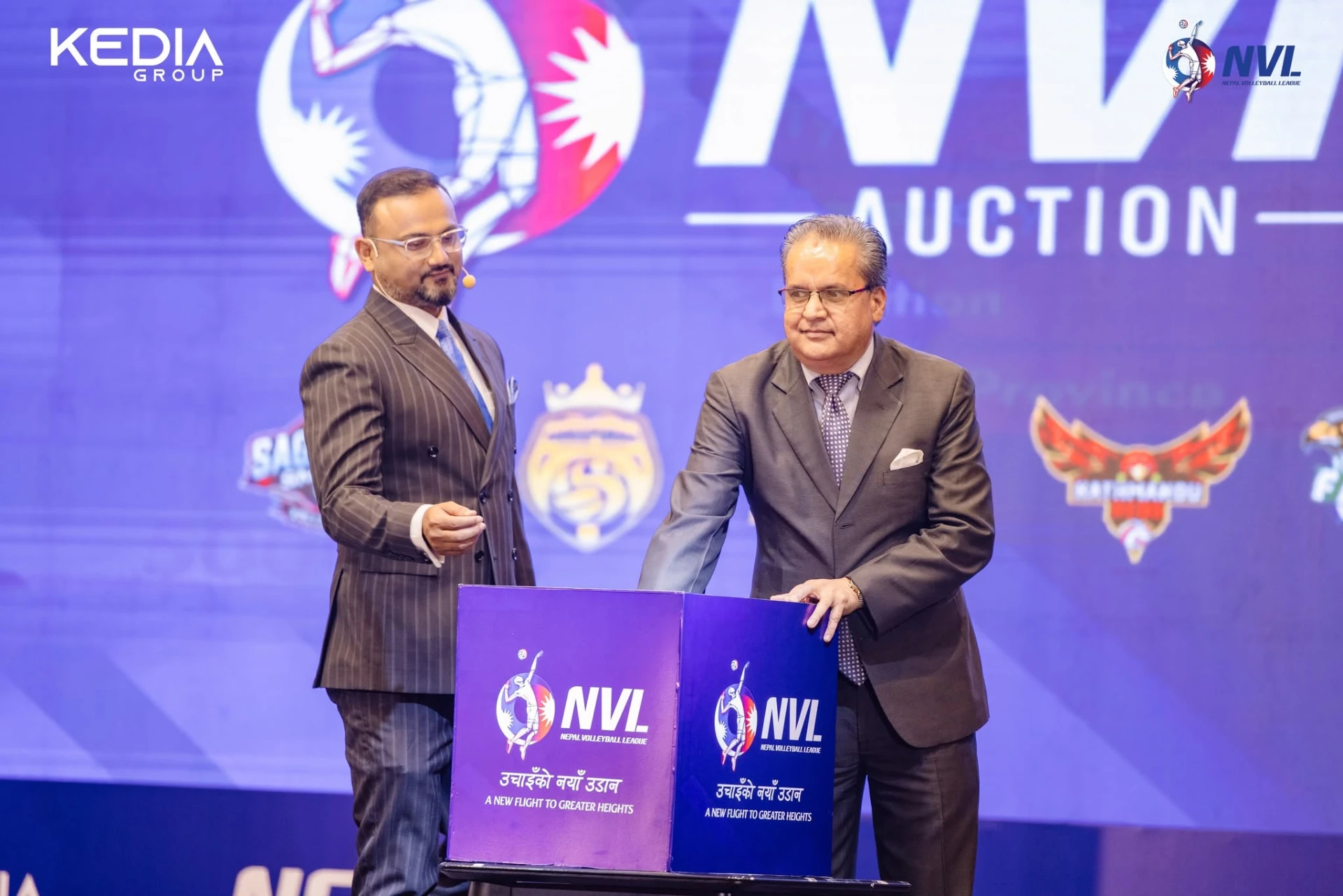 Franchise owners draw the first names on stage